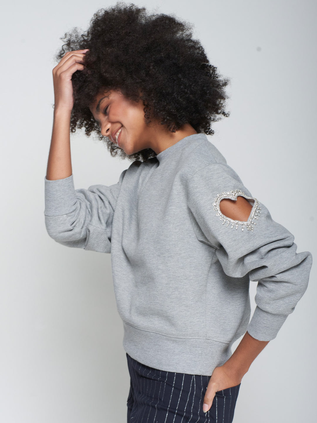 SWEATSHIRT WITH HEART CUT-OUT AND BEADING