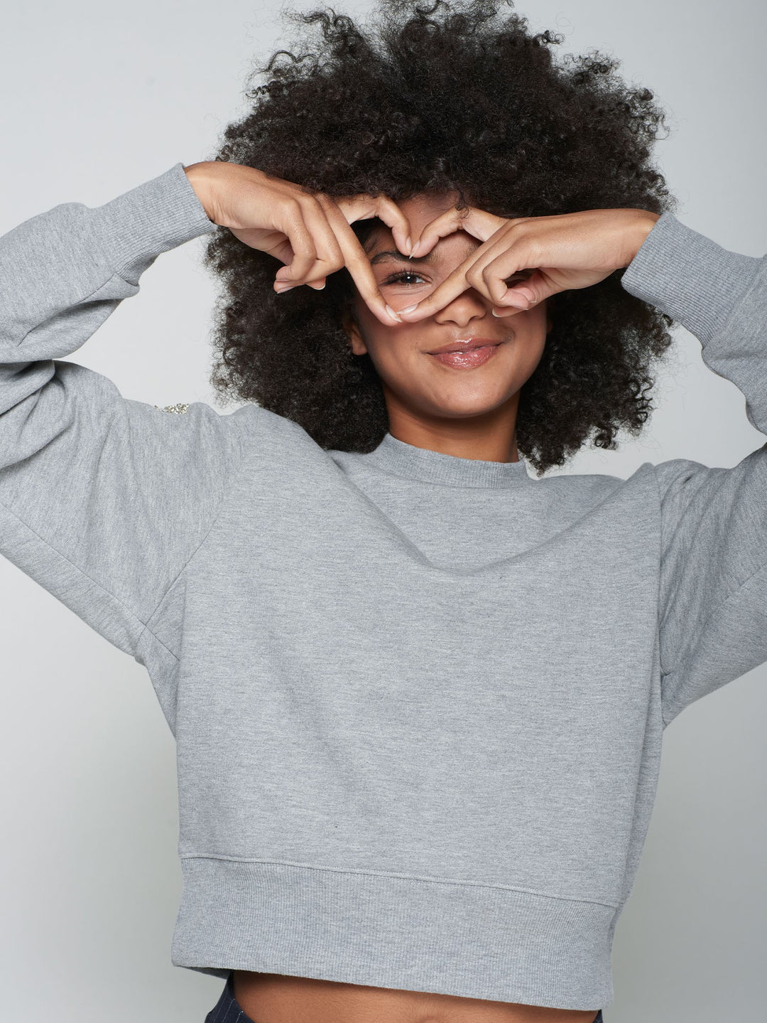 SWEATSHIRT WITH HEART CUT-OUT AND BEADING